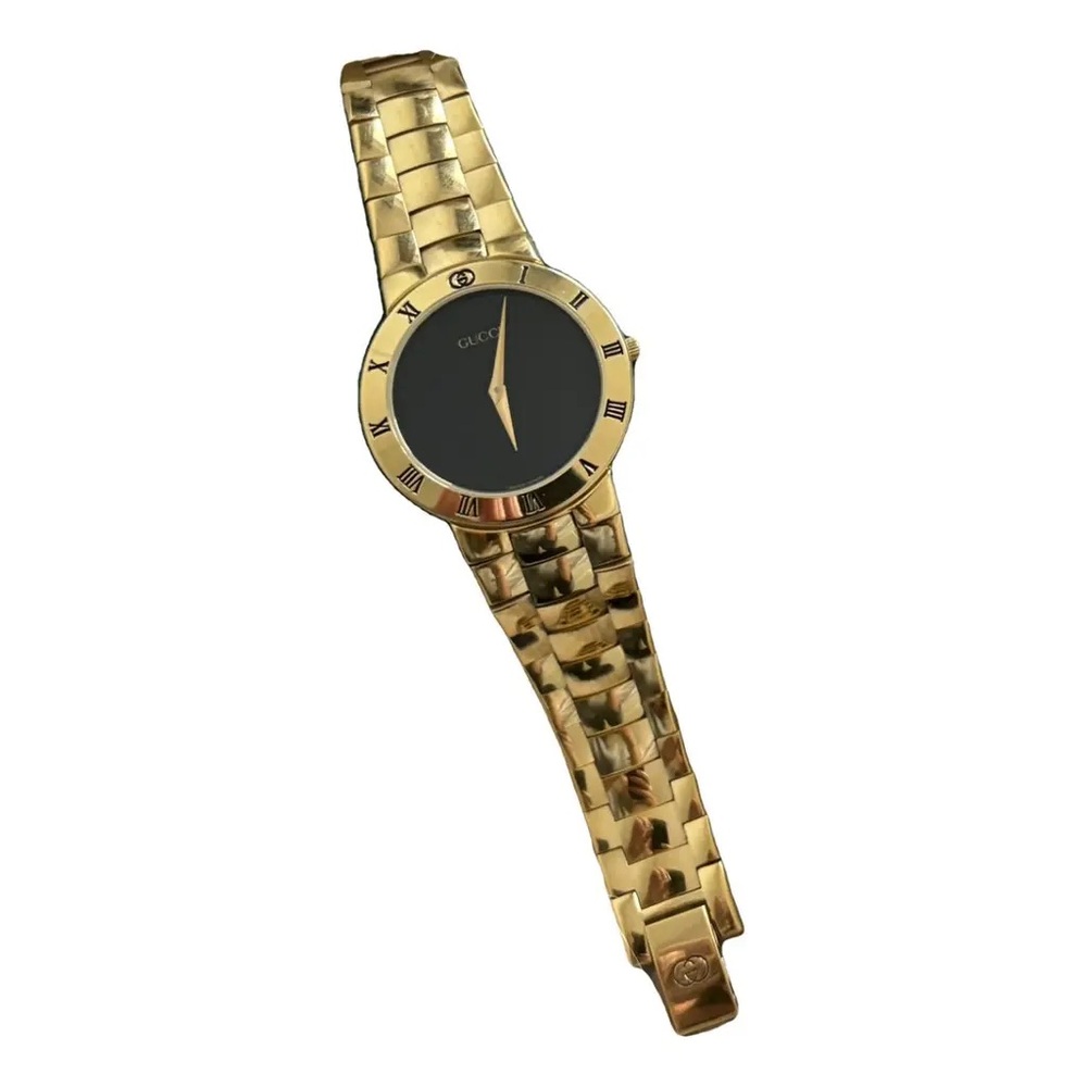 Gold and Black Gucci Watch series 3000